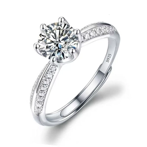 Close-up of S925 hallmark on polished sterling silver ring with sparkling round cut zircon