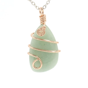 Minimalist wire-wrapped green stone pendant necklace with elegant rose gold metal accents