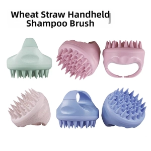 Detailed macro of wheat straw scalp massager brushes in mint, pink, and blue shades