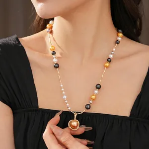 French vintage luxury multi-color pearl necklace with large gold pearl and zircon pendant