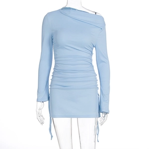 Detail of light blue ruched knit dress with asymmetric shoulder and adjustable drawstring