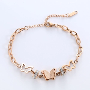 Bracelet papillon évidé en or rose avec strass brillants et chaîne de type O