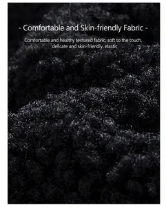 Close-up of black sherpa fleece jacket fabric showing soft curly texture and thick material