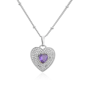 Macro shot of silver heart necklace with purple zirconia center and pave stone detail