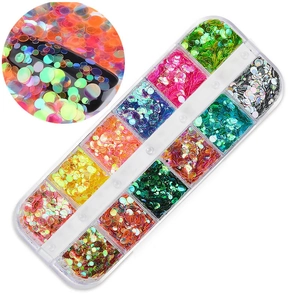 Detailed view of 12-color holographic nail sequins in a clear organizer box