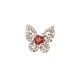 Elegant silver butterfly stud earring with clear crystals and a red gemstone center