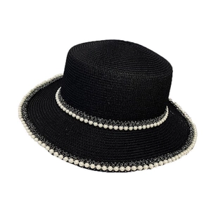 Elegant black straw sun hat for women with white pearl embellishments and wide brim