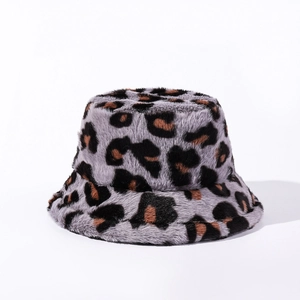Plush leopard print bucket hat with soft faux fur texture for winter fashion