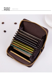 Macro shot of accordion card slots and textured brown monogram leather zip wallet