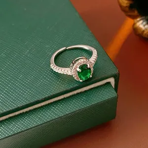 Luxury oval green zircon open ring with micro-p鑲ed diamonds in a silver finish