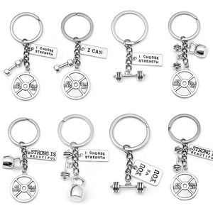 Silver metal fitness keychains with dumbbells barbells and motivational tags set