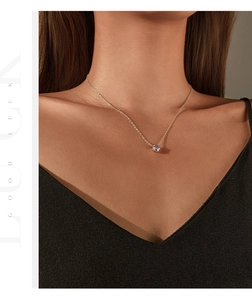 Detail of S925 sterling silver necklace featuring a lavender rose-cut diamond pendant