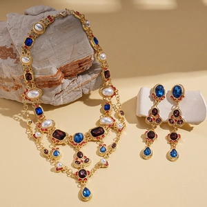 Vintage multi-layer jewelry set with blue gemstones and pearls in royal palace style