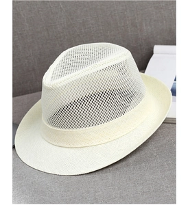 Close-up of breathable mesh fedora hat in cream white for summer sun protection
