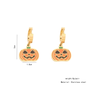 Detailed view of Halloween pumpkin earrings with dimensions 3cm by 1.8cm in gold finish