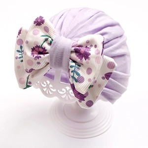 Lavender cotton baby turban hat with a large floral polka dot bow knot decoration