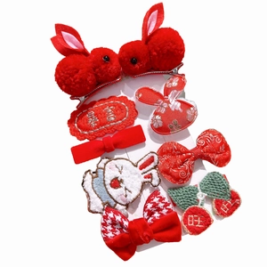 Festive red 8-piece hair clip set for girls with cute rabbit and cherry motifs