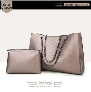 Detail of champagne gold quilted tote bag set with chain strap and small inner pouch