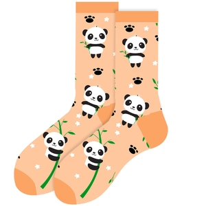 Cute pink-orange crew socks with panda and bamboo patterns in a flat lay display