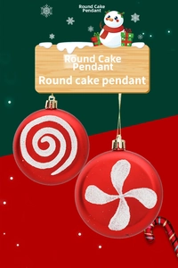 Detail of red and white spiral glitter patterns on Christmas round cake pendants