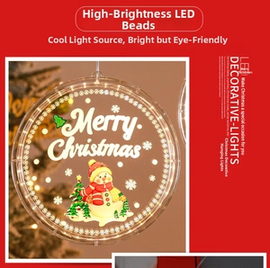 Close-up of LED Christmas hanging lamp with snowman and tree patterns for holiday decor