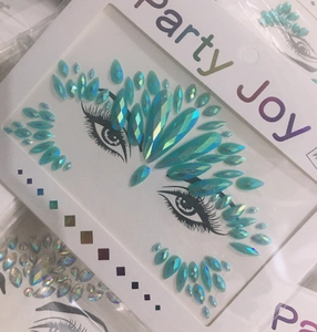 Detail of colorful multi-shape face gems and iridescent rhinestone stickers in packaging