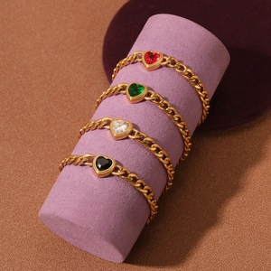 Set of four 18K gold plated stainless steel rings with colorful heart shaped zircon stones