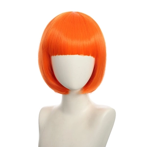 Detail view of a vibrant orange short bob wig with bangs on a professional mannequin