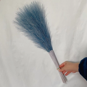 Detailed close-up of fluffy blue artificial pampas grass decor with 55cm long slender stems