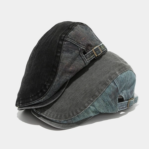 Vintage washed cotton flat caps in black and blue denim with adjustable metal buckles