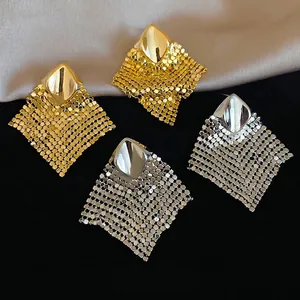 Polished diamond sequins and mesh tassel earrings in gold and silver metal finish