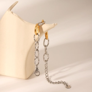 Two-tone stainless steel link bracelet with silver hammered texture and gold finish