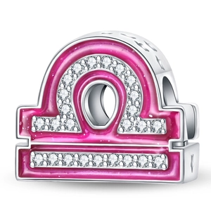Close-up of Libra zodiac charm with pink enamel and sparkling crystals for DIY bracelets