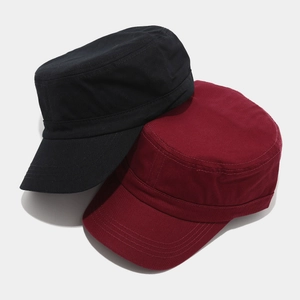 Detail of black and wine red cotton flat top military caps with stitched brims