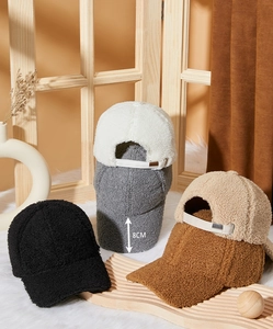 Three plush winter baseball caps in black, beige, and brown with 8cm depth detail