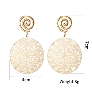 Detailed view of large gold hollow earrings with size measurements of 7cm and 4cm