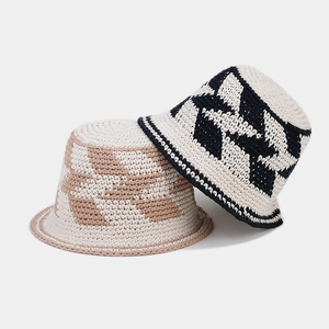 Close-up of handmade crochet hollow diamond pattern on breathable cotton bucket hats