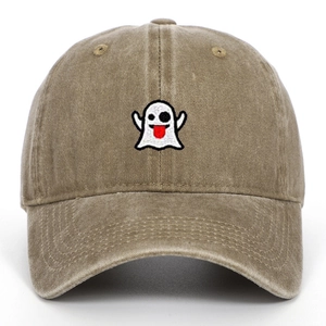 Close-up of cute ghost embroidery on khaki washed cotton baseball cap with curved brim