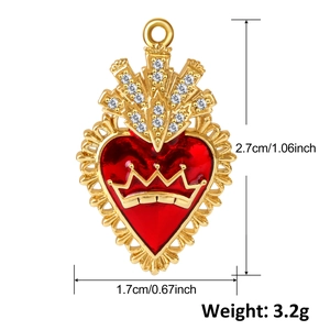 Detail of ruby heart pendant with gold crown and crystal rays showing size 2.7x1.7cm