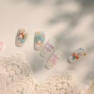 Stickers ongles lapins mignons avec dégradé vert menthe et motifs de voyage