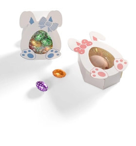 Detail of pink and blue egg-shaped rabbit candy boxes with clear windows for Easter