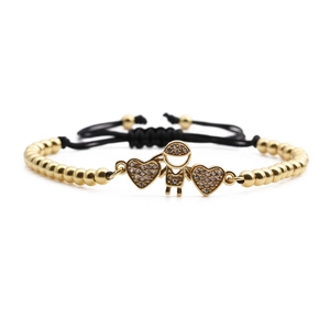 Adjustable black cord bracelet with gold beads, heart pendants and boy-girl charms with zircon