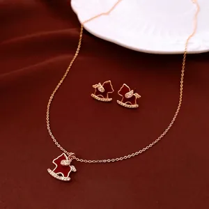 Exquisite 18K gold plated rocking horse jewelry set with red enamel and crystals