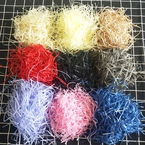 Assorted colorful raffia shredded paper filler for gift boxes in nine vibrant colors