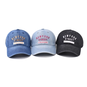 Three-pack washed denim baseball caps with New York embroidery in blue and black colors