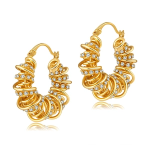 Gold-plated spiral coil hoop earrings with sparkling cubic zirconia on white background