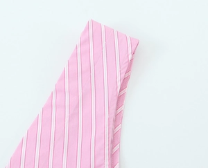 Close-up of pink and white vertical stripes on summer poplin fabric for women