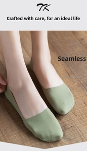 Close-up of seamless light green ice silk no-show socks with low-cut design on model