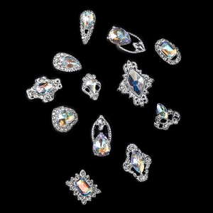 Silver alloy nail art charms set with AB color crystals in multiple geometric shapes
