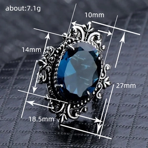 Anello vintage con pietra specchio blu reale e dettagli incisi in metallo argentato